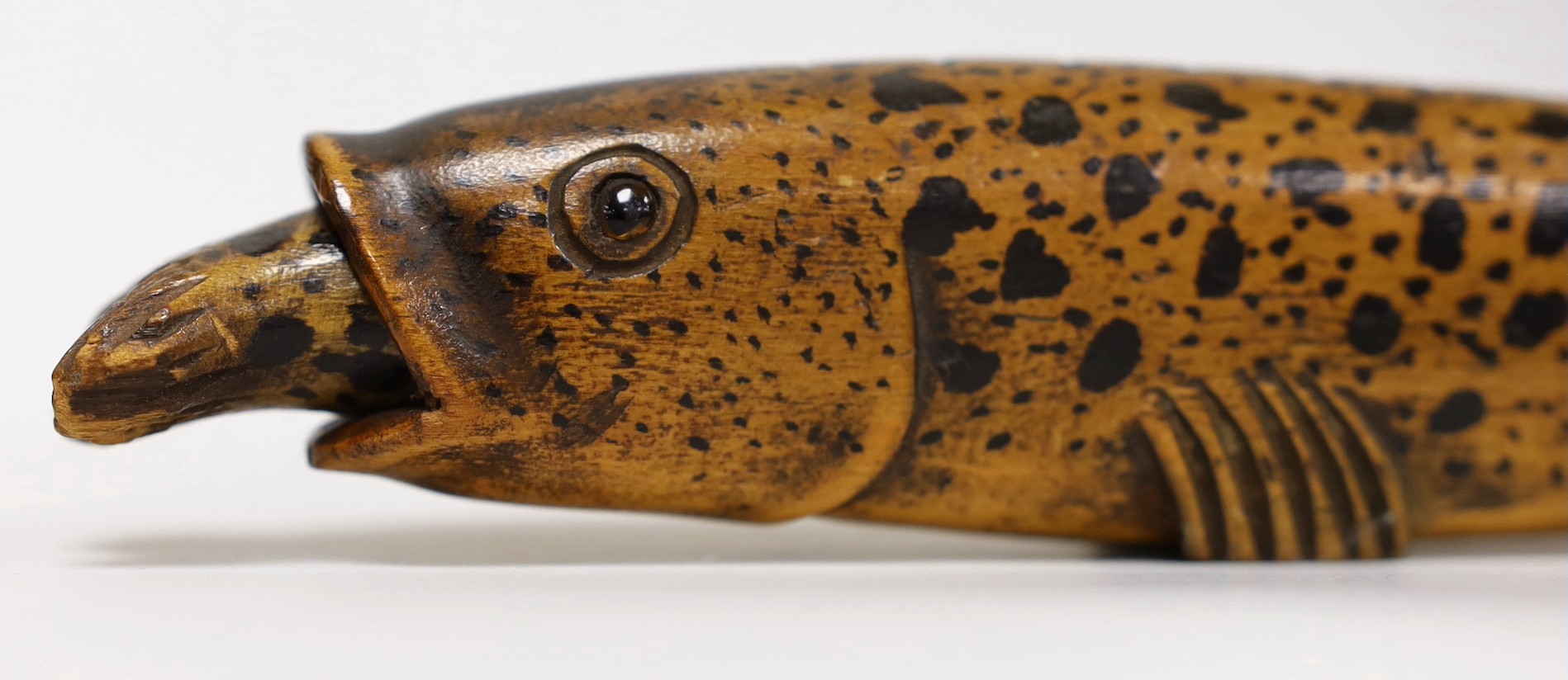 A 19th century treen flask with stopper, modelled as a rainbow trout, 26.5cm.